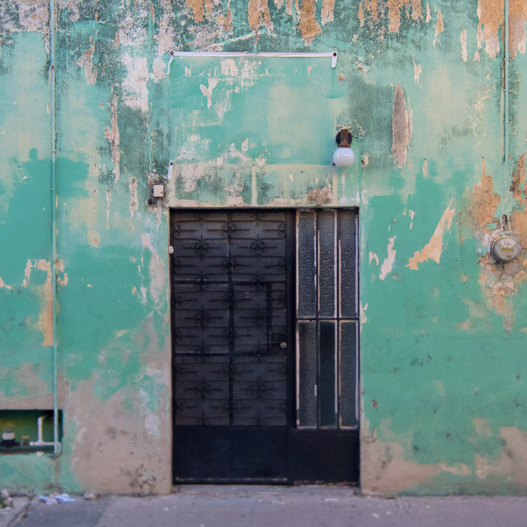 Black metal door in Mérida