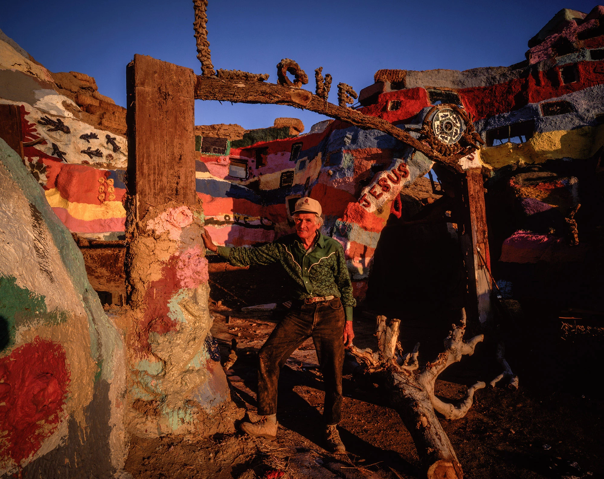 Leonard Knight at his Salvation Mountain in Slab City